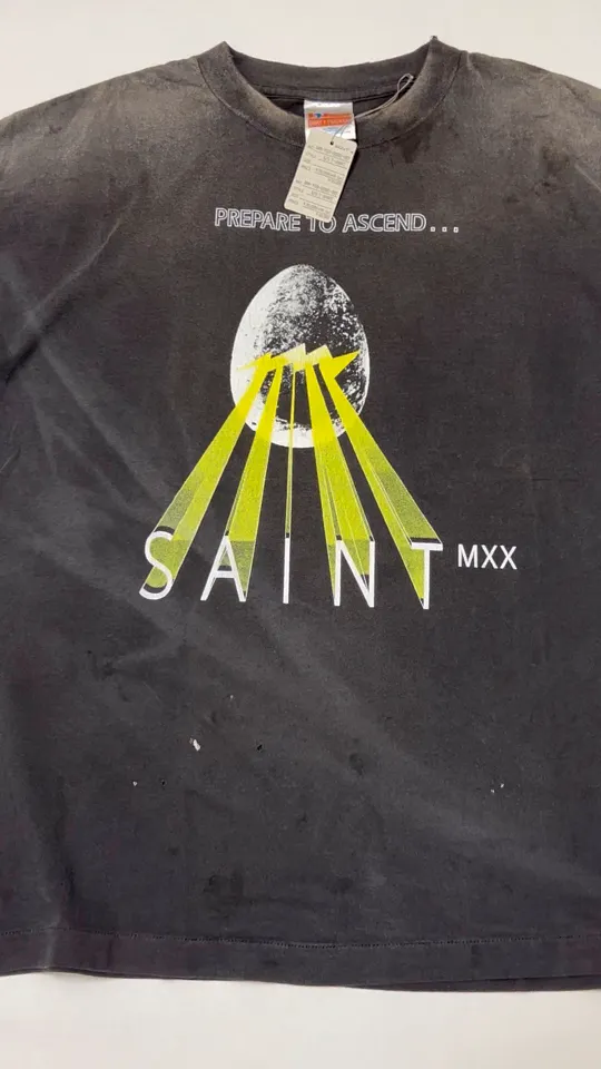 SAINT Mxxxxxx EGG SS TEE/BLK Broken egg shell/SAINT LOGO projection distressed retro short-sleeves Washed black S-XL Correct version Customized co-branded main mark/washed mark/cherub mark Tubular fabric Garment dyeing Rewashing water fading Destroying graffiti Simulating natural distressed effect Top-notch printing technology Washing treatment
